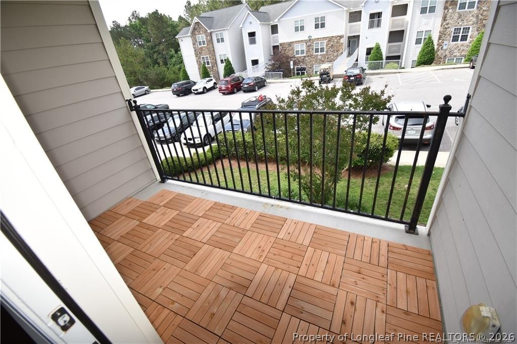 159 Gallery Drive, Unit 201 Spring Lake, NC 28390 - Photo 14 of 18 a view of a balcony with an outdoor space