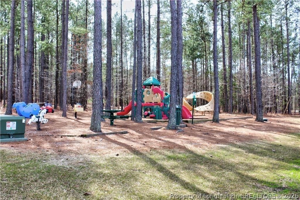 159 Gallery Drive, Unit 201 Spring Lake, NC 28390 - Photo 17 of 18 a view of outdoor space with garden