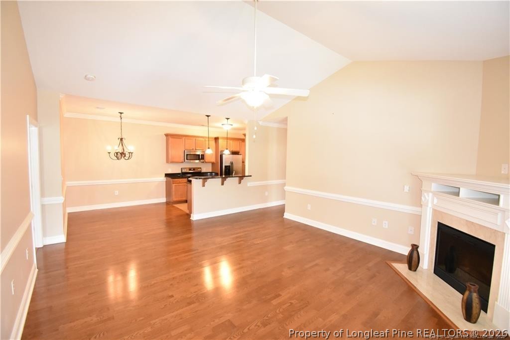 159 Gallery Drive, Unit 201 Spring Lake, NC 28390 - Photo 6 of 18 a view of a kitchen with furniture and a fireplace