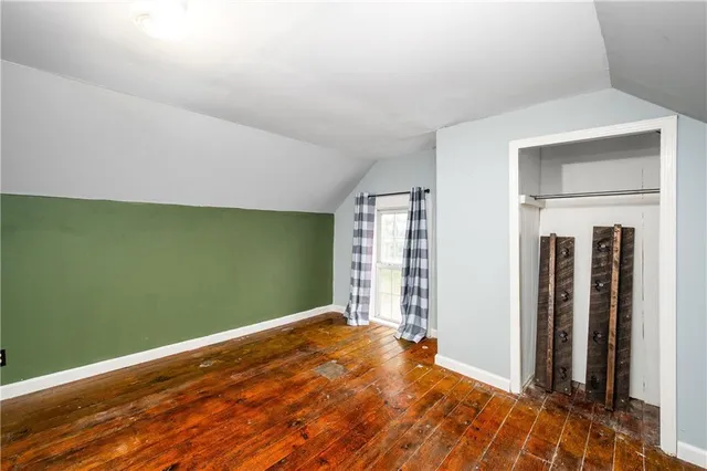 a view of empty room with front door