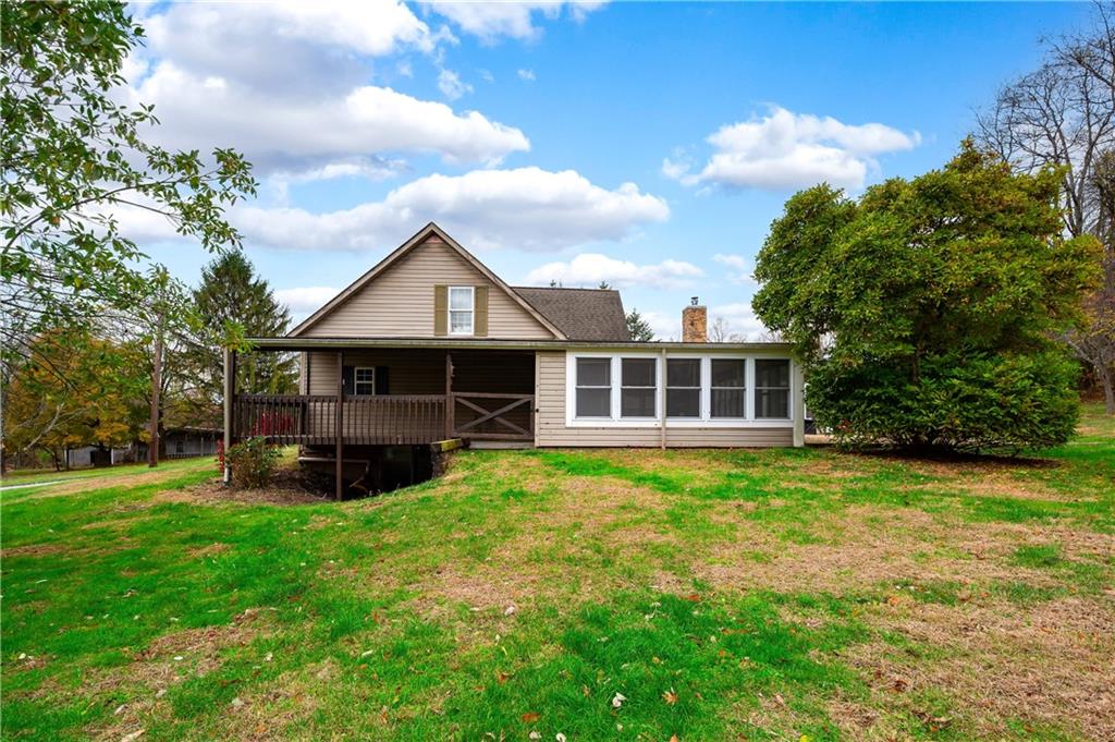172 Queen Junction Road Butler, PA 16001 - Photo 29 of 35 a front view of a house with a yard table and chairs