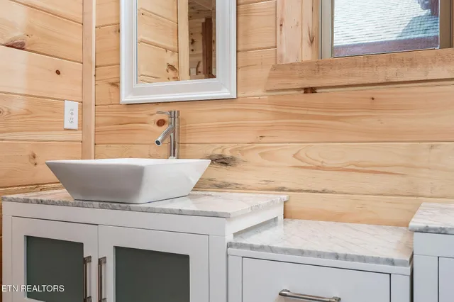 a bathroom with a sink and a bathtub