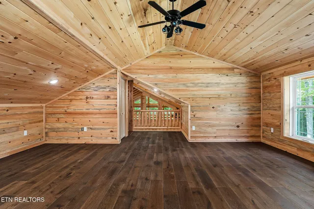 a view of a room with wooden floors and lots of wooden floor