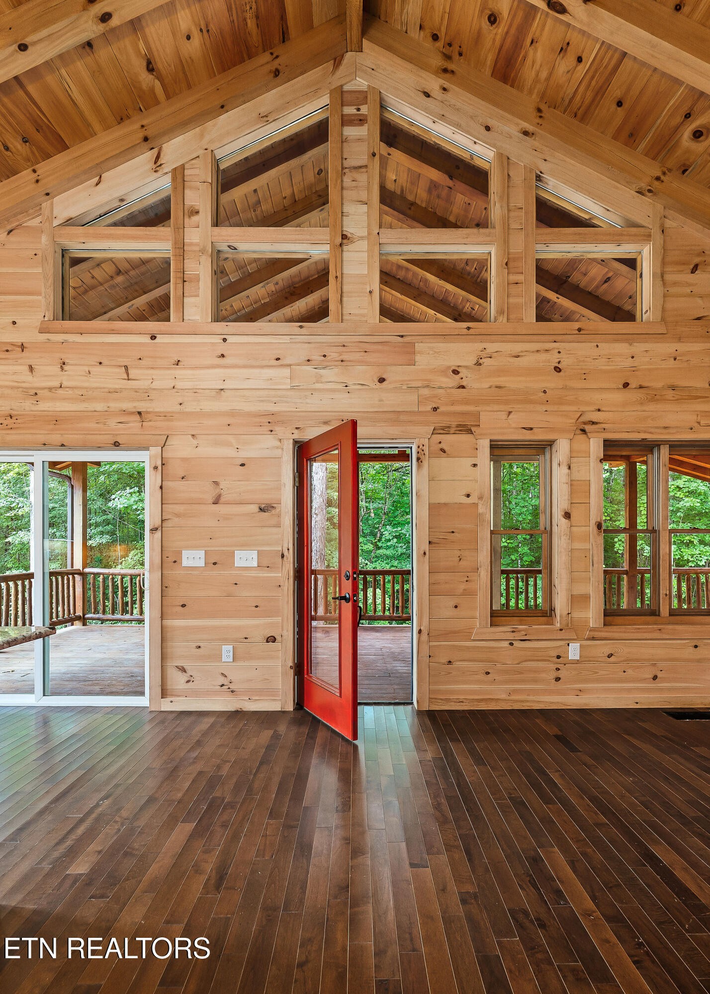 106 Raccoon Lane Jamestown, TN 38556 - Photo 7 of 38 a view of a brick house with wooden floor and windows