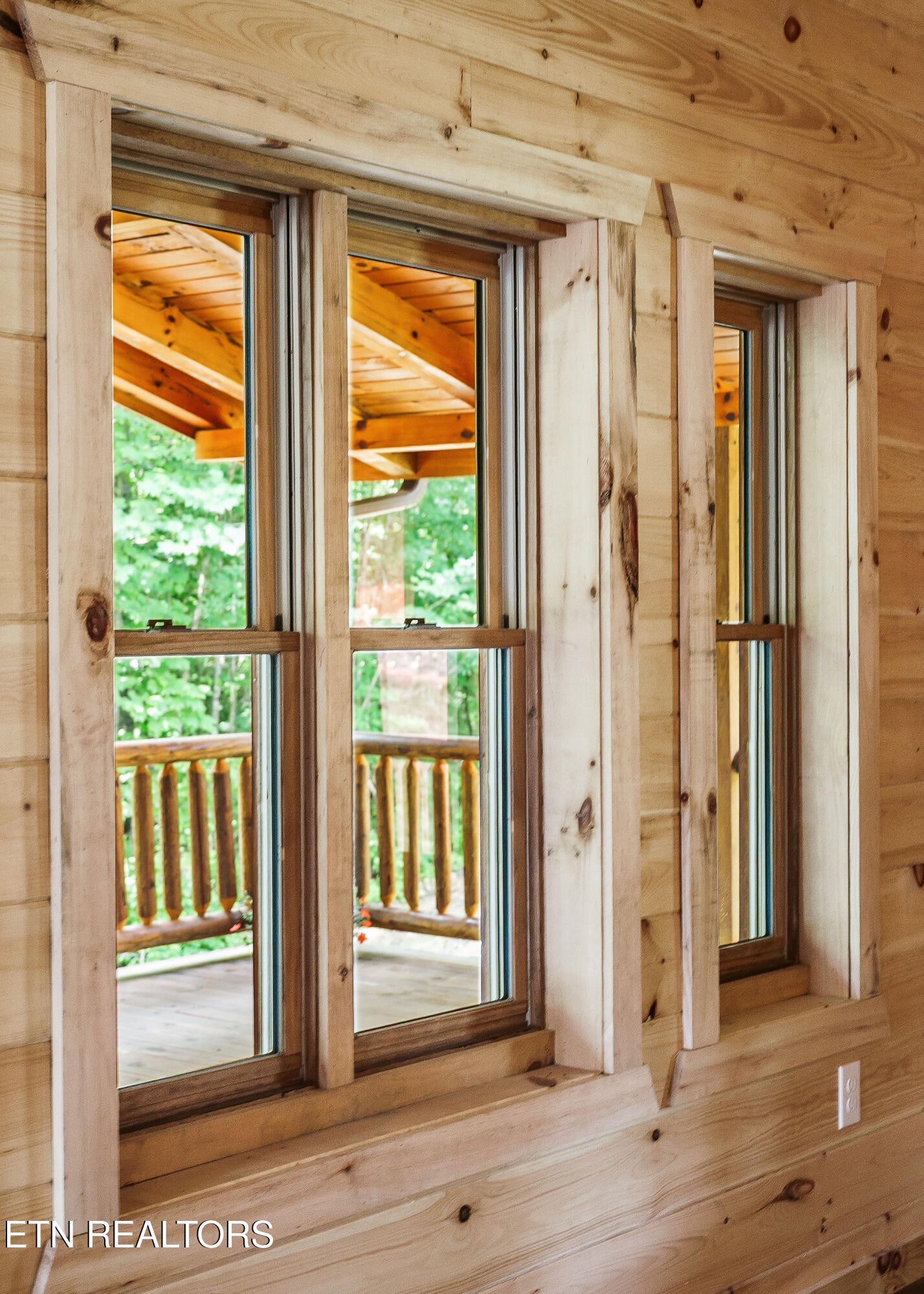 106 Raccoon Lane Jamestown, TN 38556 - Photo 10 of 38 a view of a bathroom with a window and wooden floor