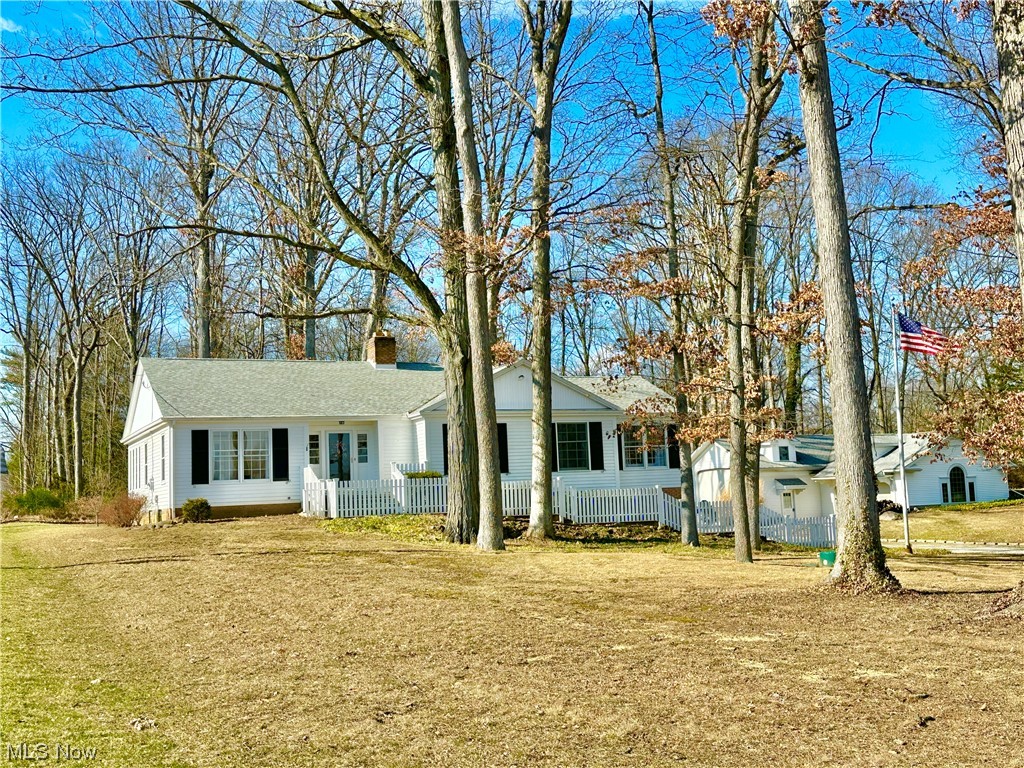 6130 Renninger Road New Franklin, OH 44319 - Photo 1 of 30 Ranch home & 4 c. garage/workshop featuring front yard