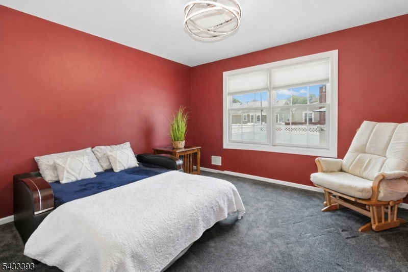 33 Stanton Street Clark, NJ 07066 - Photo 26 of 37 a bedroom with two beds and a large window