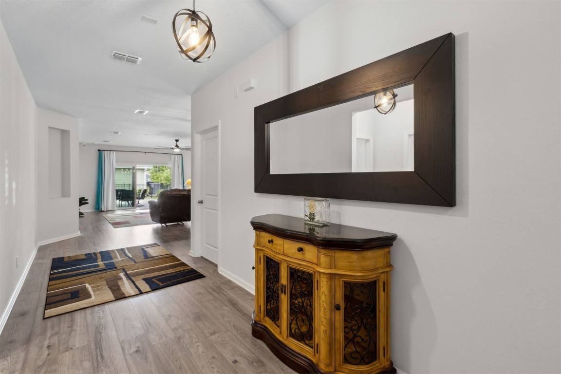 75251 White Rabbit Avenue Yulee, FL 32097 - Photo 14 of 83 a living room with furniture and a flat screen tv