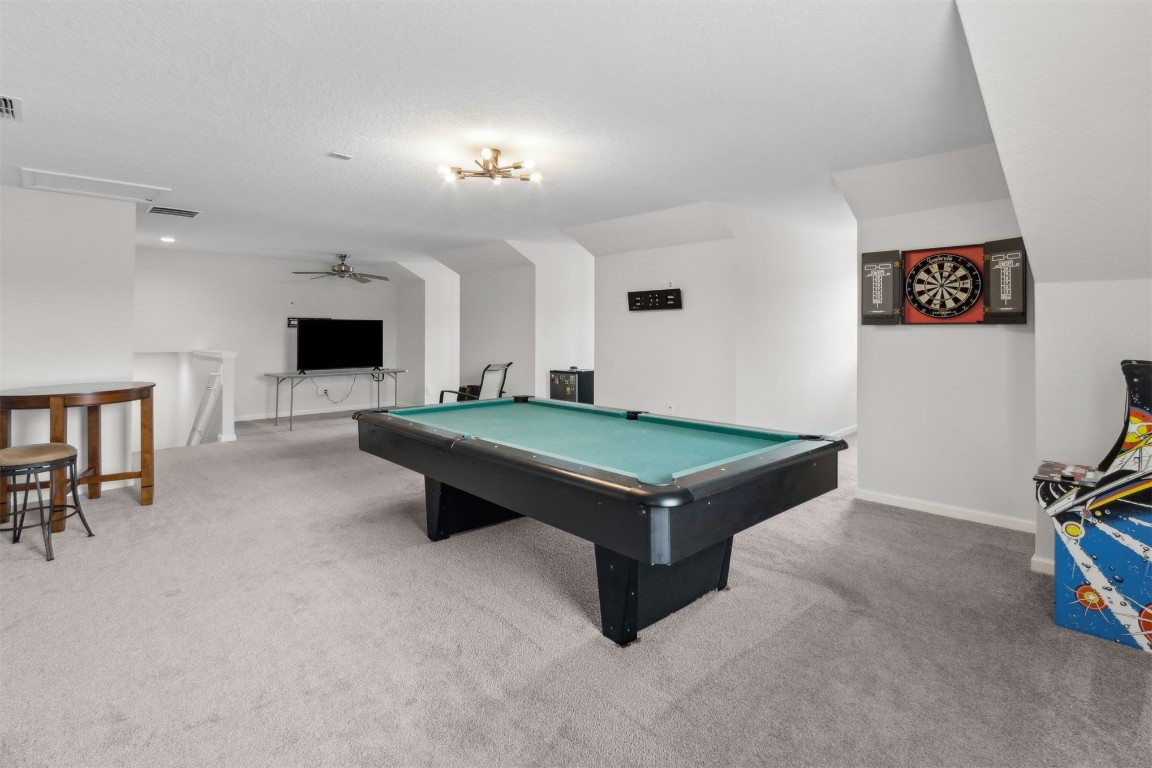 75251 White Rabbit Avenue Yulee, FL 32097 - Photo 36 of 83 a room with pool table and flat screen tv