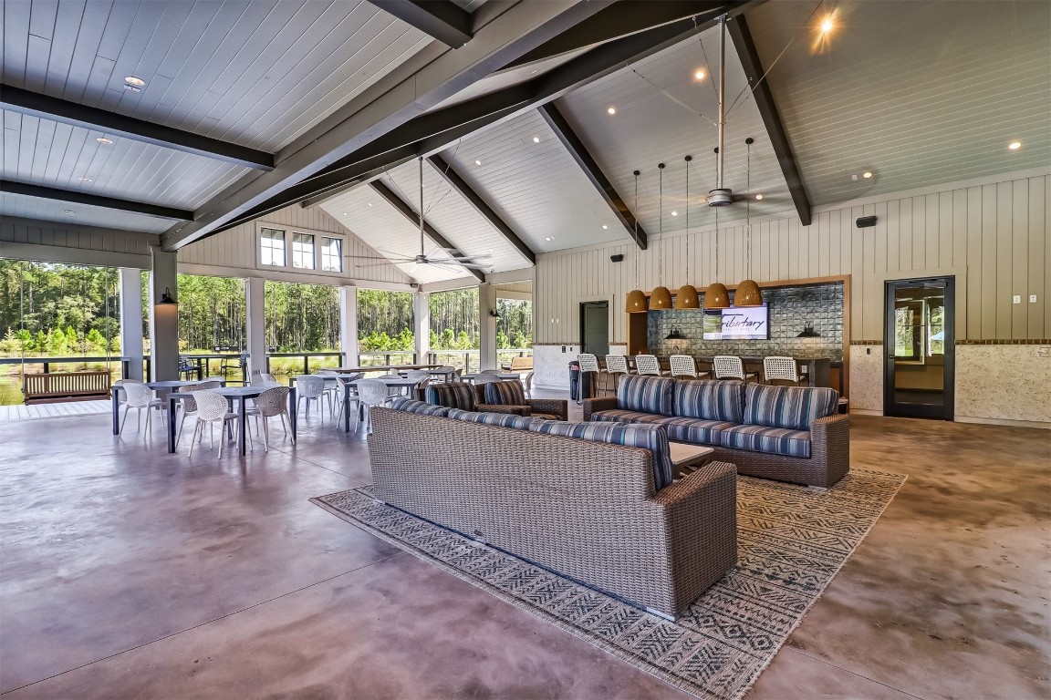 75251 White Rabbit Avenue Yulee, FL 32097 - Photo 62 of 83 a living room with lots of furniture and kitchen view