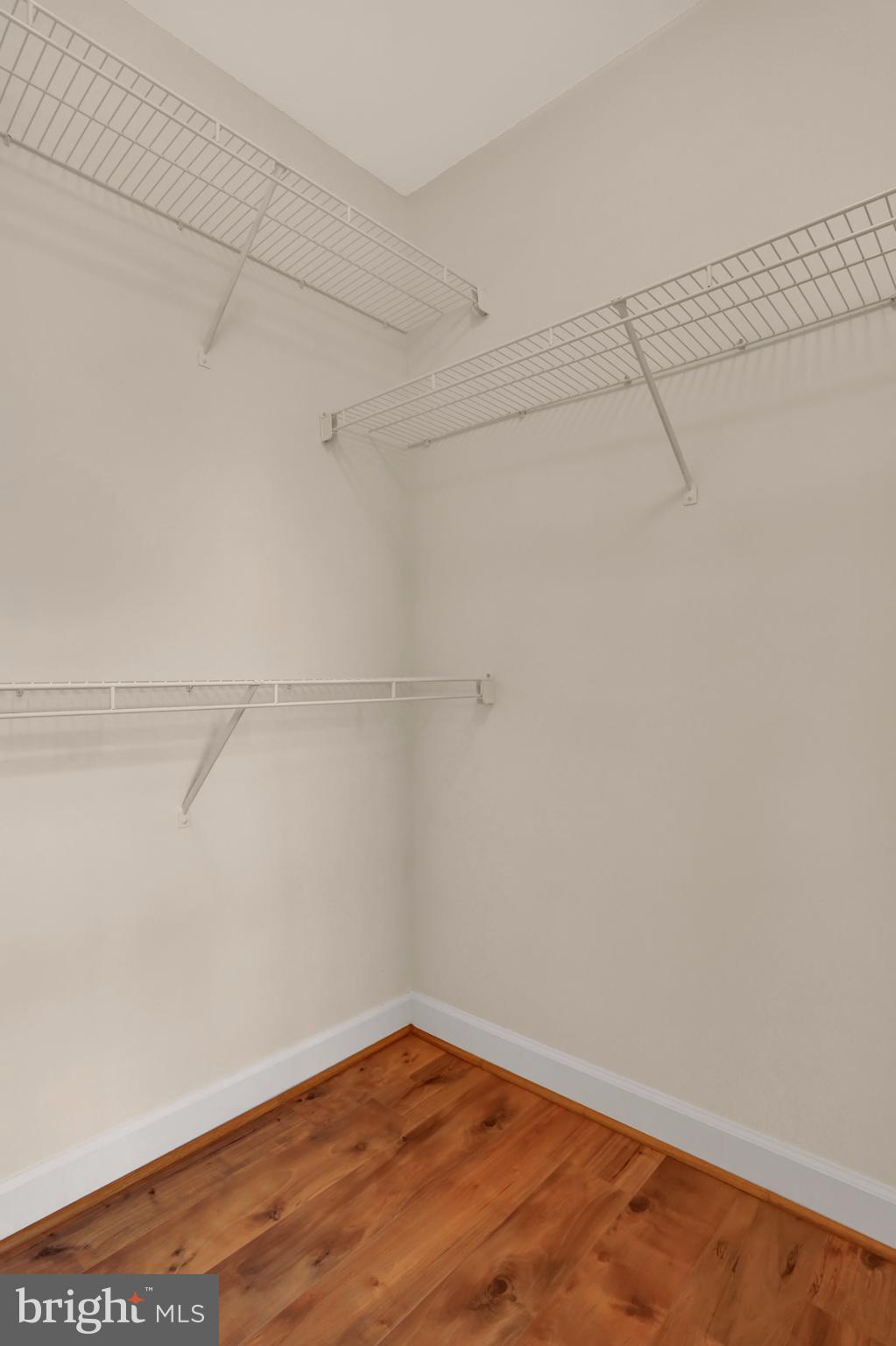 6428 View Point Court Frederick, MD 21703 - Photo 14 of 27 a view of a room with racks on the wall