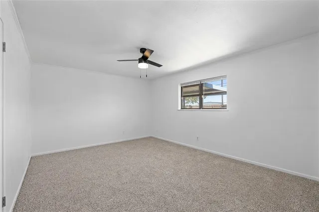 a view of a big room with carpet