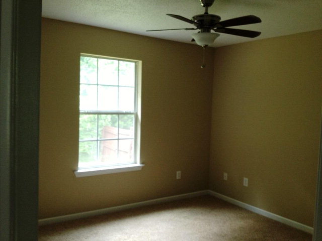 305 Autumn Ridge Trail Gray, GA 31032 - Photo 8 of 9 an empty room with a window