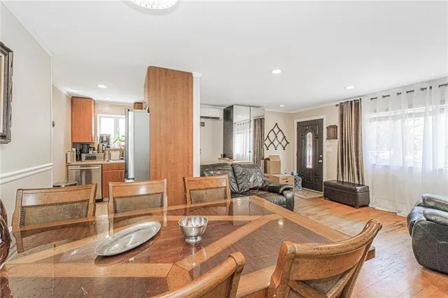 a kitchen with a sink cabinets and window