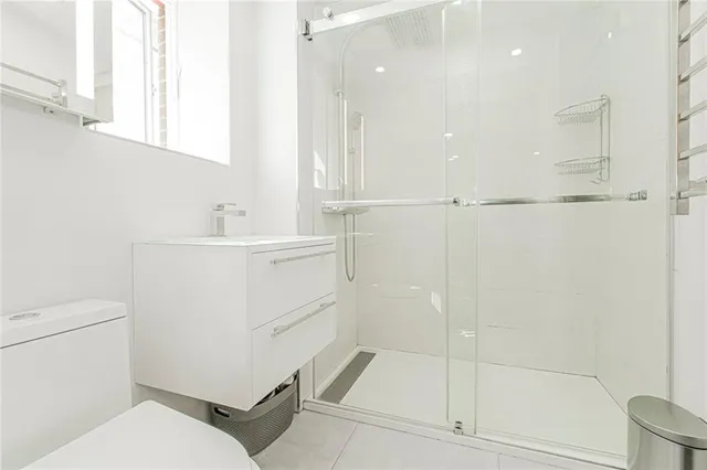 a workspace with furniture and a potted plant