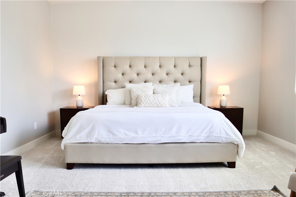 2018 Risborough Court Bakersfield, CA 93311 - Photo 29 of 73 a large bed sitting in a bedroom and lamp