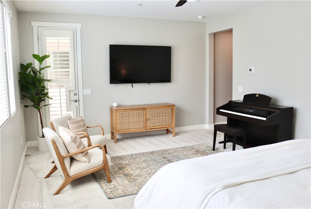 2018 Risborough Court Bakersfield, CA 93311 - Photo 30 of 73 a bedroom with a bed and a flat screen tv