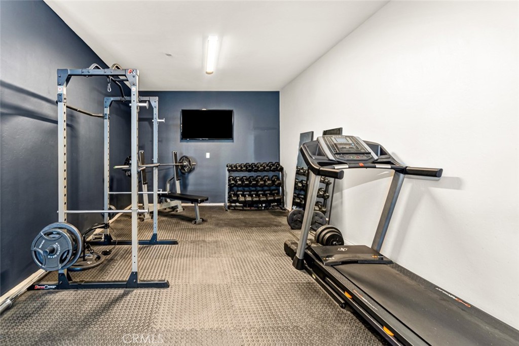 2018 Risborough Court Bakersfield, CA 93311 - Photo 44 of 73 a view of a room with gym equipment