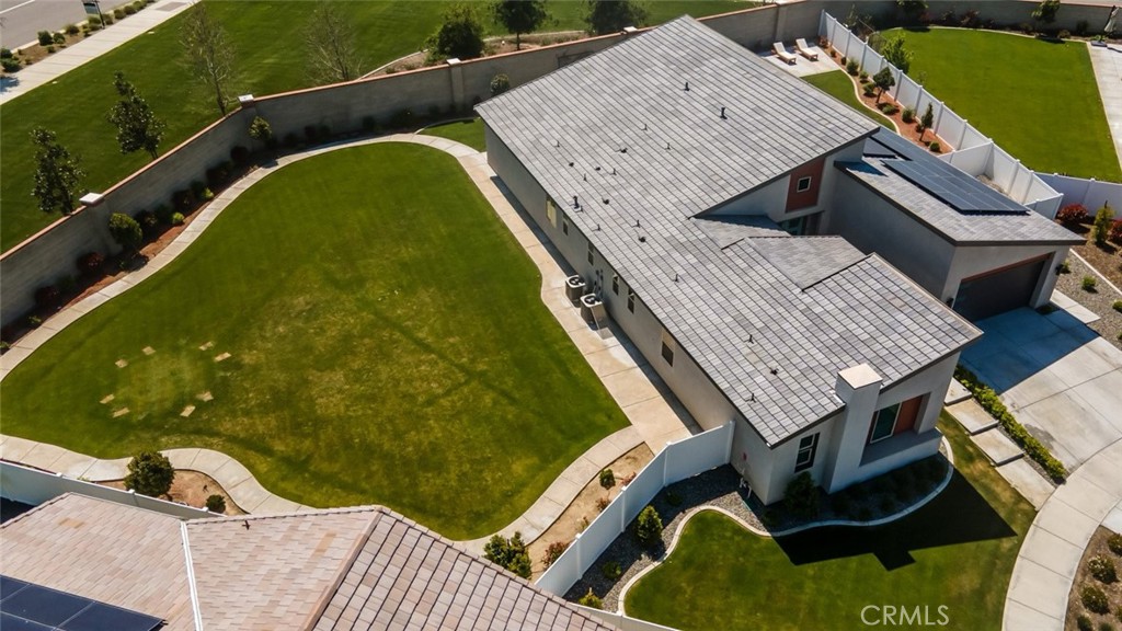 2018 Risborough Court Bakersfield, CA 93311 - Photo 46 of 73 an aerial view of a house with a garden and swimming pool