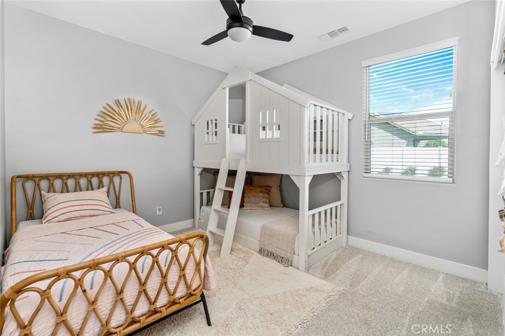 2018 Risborough Court Bakersfield, CA 93311 - Photo 6 of 73 a bedroom with a bed and a large window