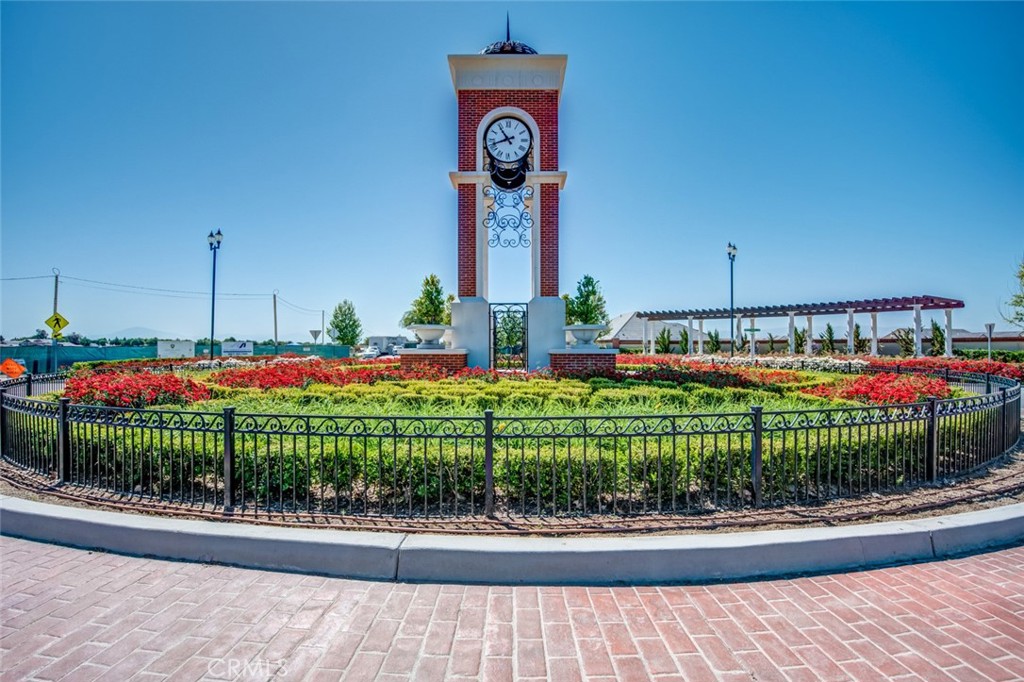 2018 Risborough Court Bakersfield, CA 93311 - Photo 61 of 73 a front view of a house with a garden and signage