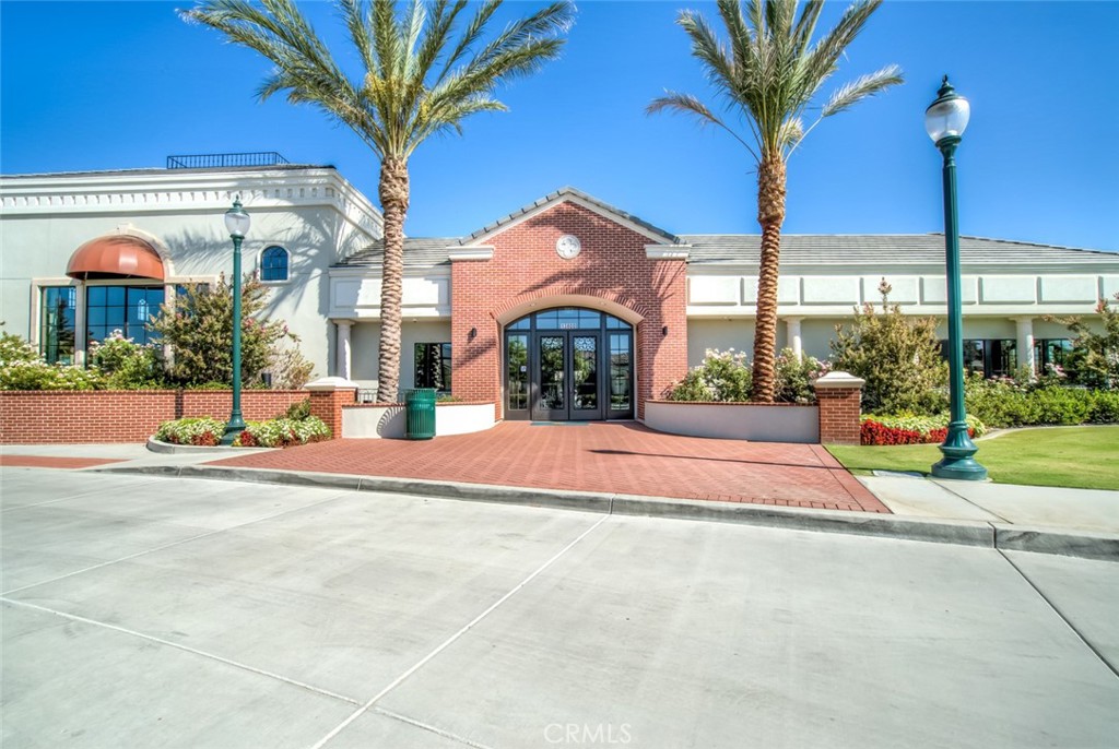 2018 Risborough Court Bakersfield, CA 93311 - Photo 65 of 73 a view of a house with a yard and potted plants
