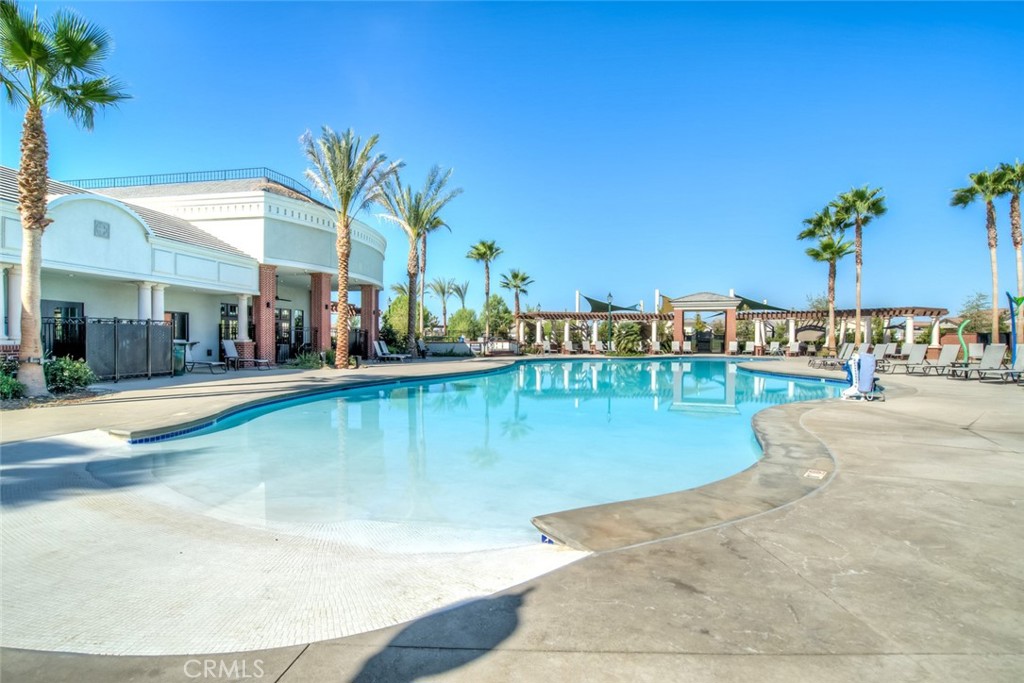 2018 Risborough Court Bakersfield, CA 93311 - Photo 66 of 73 a view of a swimming pool with an outdoor seating