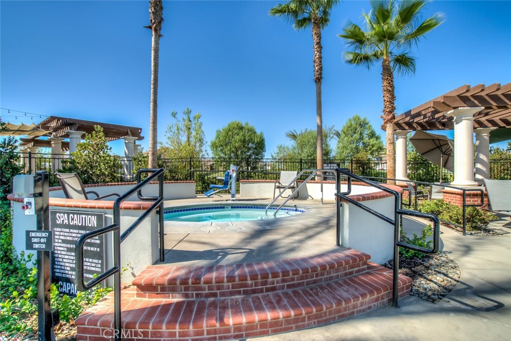 2018 Risborough Court Bakersfield, CA 93311 - Photo 70 of 73 a view of a patio with a table chairs and a potted plants