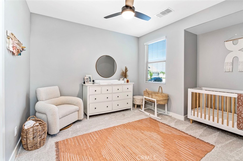 2018 Risborough Court Bakersfield, CA 93311 - Photo 7 of 73 a bedroom with furniture and a window