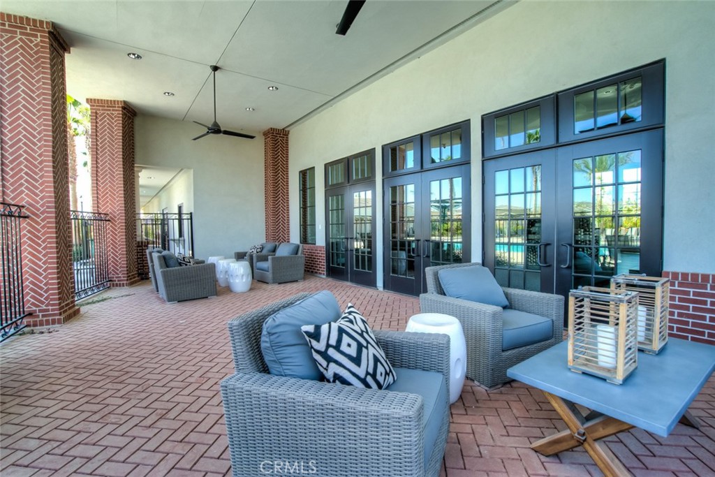 2018 Risborough Court Bakersfield, CA 93311 - Photo 71 of 73 a living room with furniture wooden floor and a large window