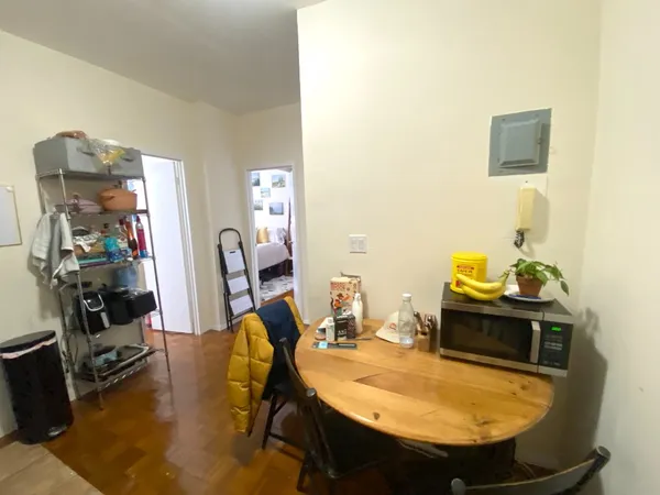 a room with table and chairs