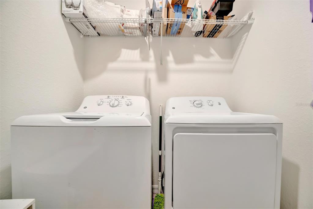 17724 Gawthrop Drive, Unit 101 Bradenton, FL 34211 - Photo 24 of 28 a utility room with dryer and washer