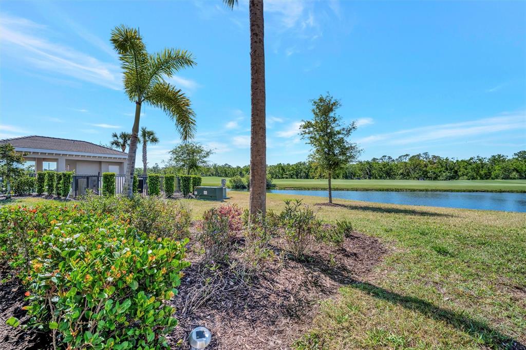 17724 Gawthrop Drive, Unit 101 Bradenton, FL 34211 - Photo 25 of 28 a view of a garden with a house