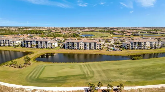 a view of swimming pool with outdoor seating