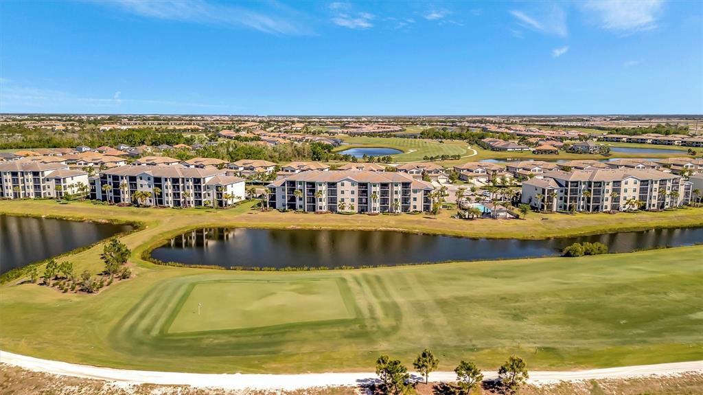 17724 Gawthrop Drive, Unit 101 Bradenton, FL 34211 - Photo 3 of 28 a view of swimming pool with outdoor seating