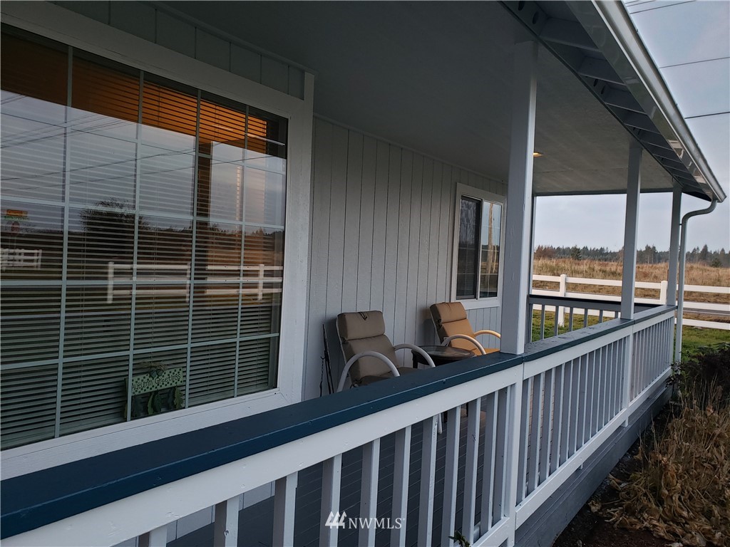 18301 Brandywine Court Southwest Rochester, WA 98579 - Photo 2 of 25 a view of balcony with a potted plant