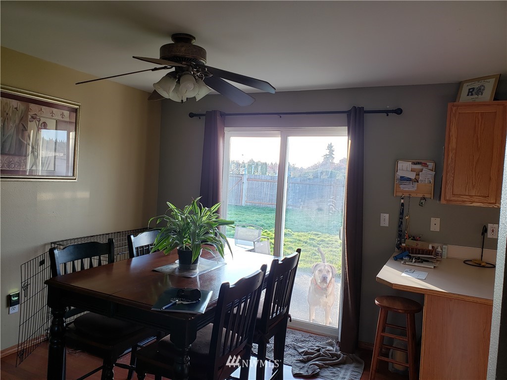 18301 Brandywine Court Southwest Rochester, WA 98579 - Photo 16 of 25 a view of a dining room with furniture window and outside view