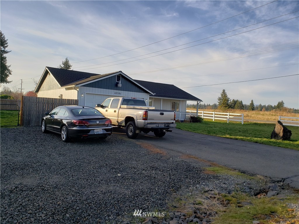 18301 Brandywine Court Southwest Rochester, WA 98579 - Photo 4 of 25 a car parked in front of a house