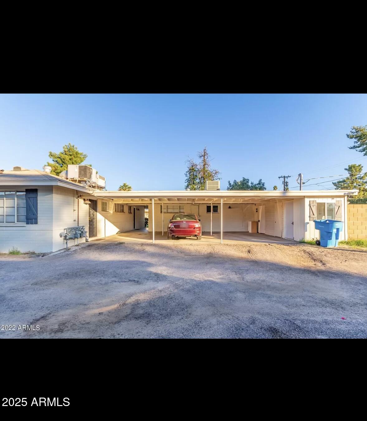 6233 North 14th Street, Unit A Phoenix, AZ 85014 - Photo 5 of 5 a view of a big yard with an outdoor seating