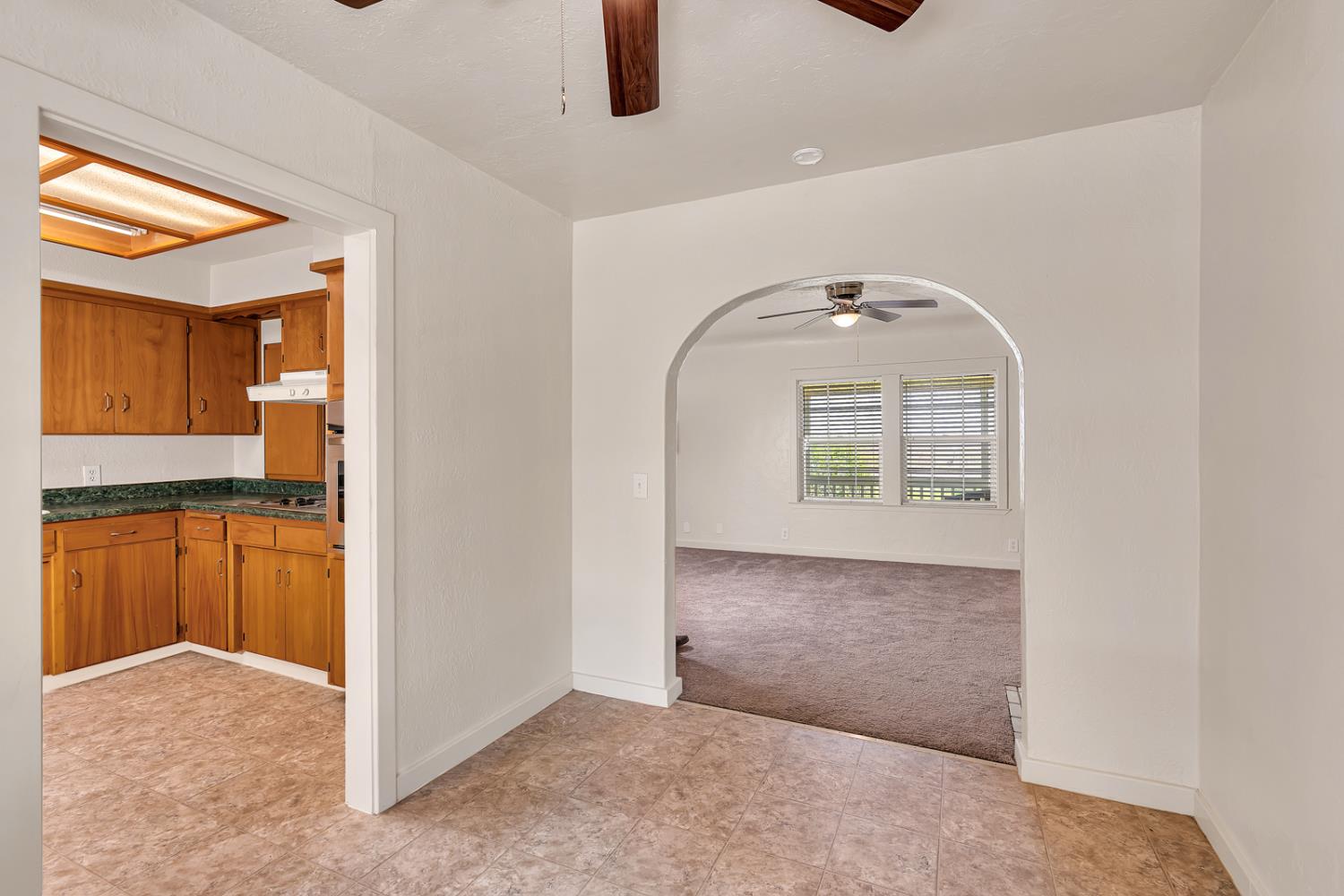 44671 Hobart Road Dos Palos, CA 93620 - Photo 14 of 43 Dining space looking at living/family room and kitchen