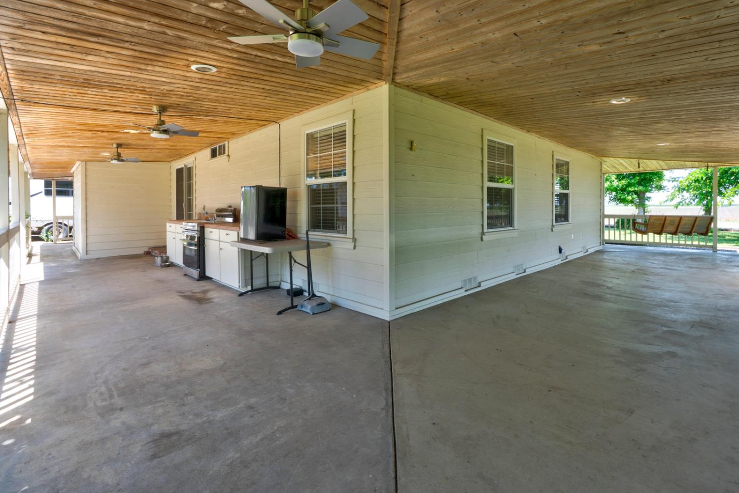 44671 Hobart Road Dos Palos, CA 93620 - Photo 22 of 43 covered patio view of outdoor kitchen & the 2 bedrooms windows