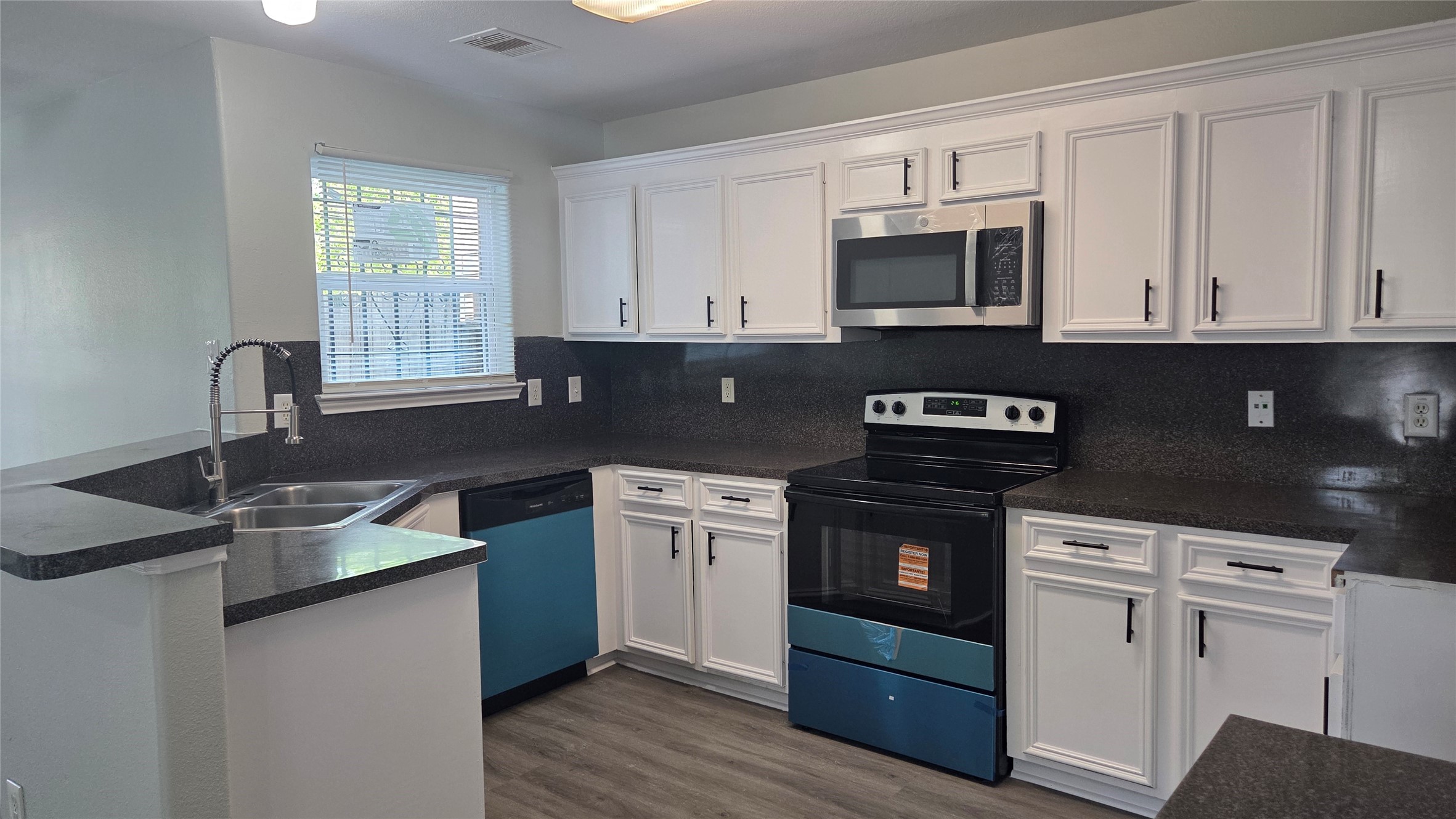 4121 Mallow Street, Unit A/B Houston, TX 77051 - Photo 1 of 50 Unit A - Kitchen with New Stainless Steel Appliances