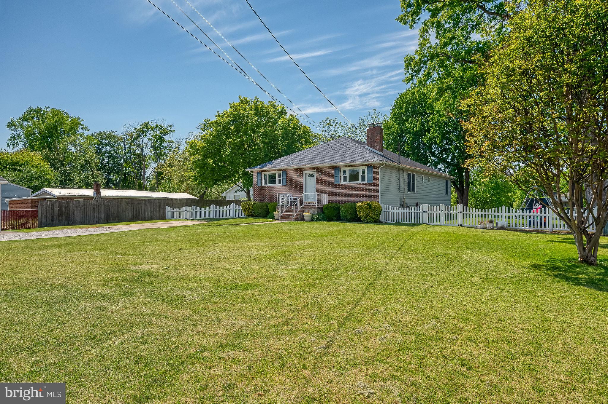 2222 Monocacy Road Essex, MD 21221 - Photo 2 of 70 Charming home with lush green lawn.