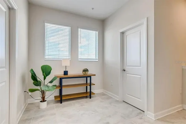 a living room with furniture and a window