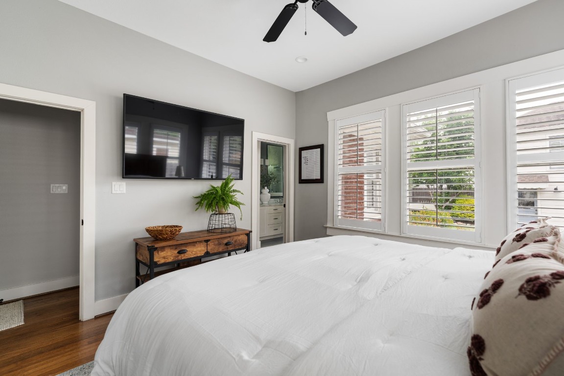3206 Morrison Street Houston, TX 77009 - Photo 13 of 30 a bedroom with a bed and a large window