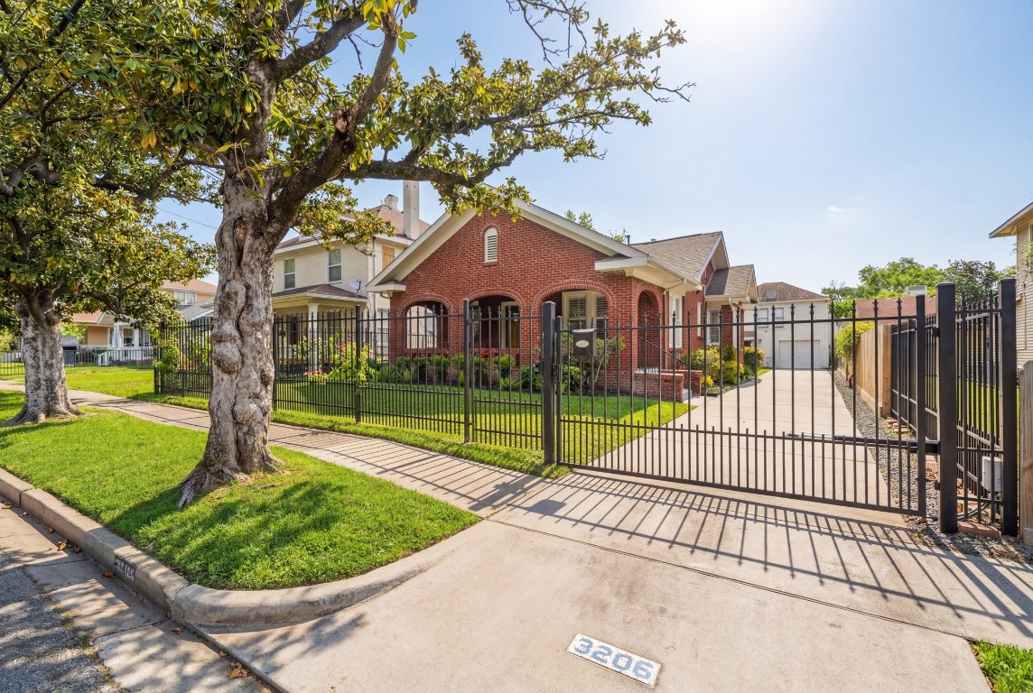 3206 Morrison Street Houston, TX 77009 - Photo 2 of 30 a view of a garden with a slide