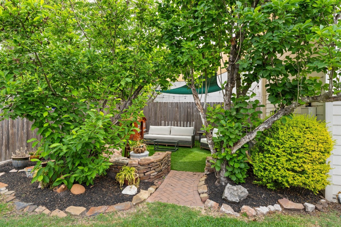 3206 Morrison Street Houston, TX 77009 - Photo 21 of 30 a garden with trees in front of it