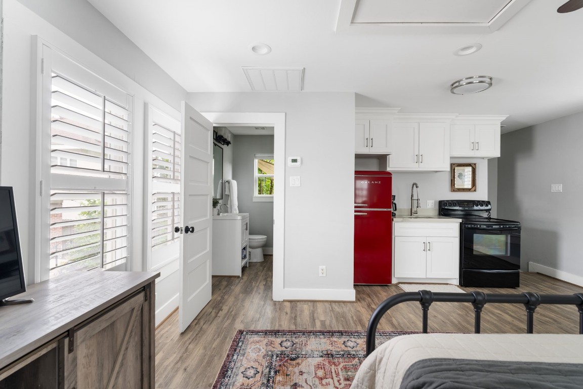 3206 Morrison Street Houston, TX 77009 - Photo 25 of 30 a bedroom with furniture and a window
