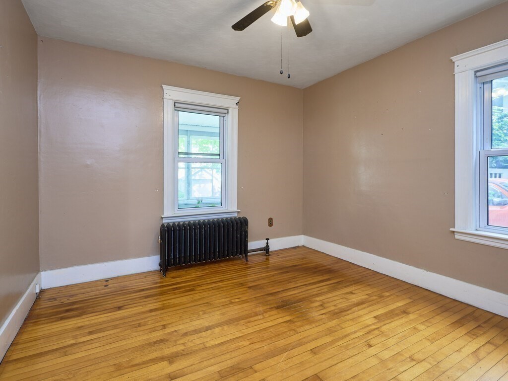 88 Beaconsfield Road Worcester, MA 01602 - Photo 8 of 34 a view of an empty room with a window