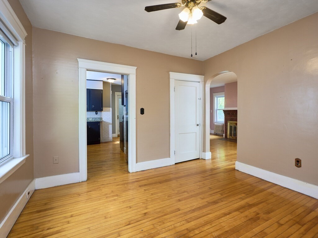 88 Beaconsfield Road Worcester, MA 01602 - Photo 9 of 34 a view of livingroom with hardwood floor and ceiling fan